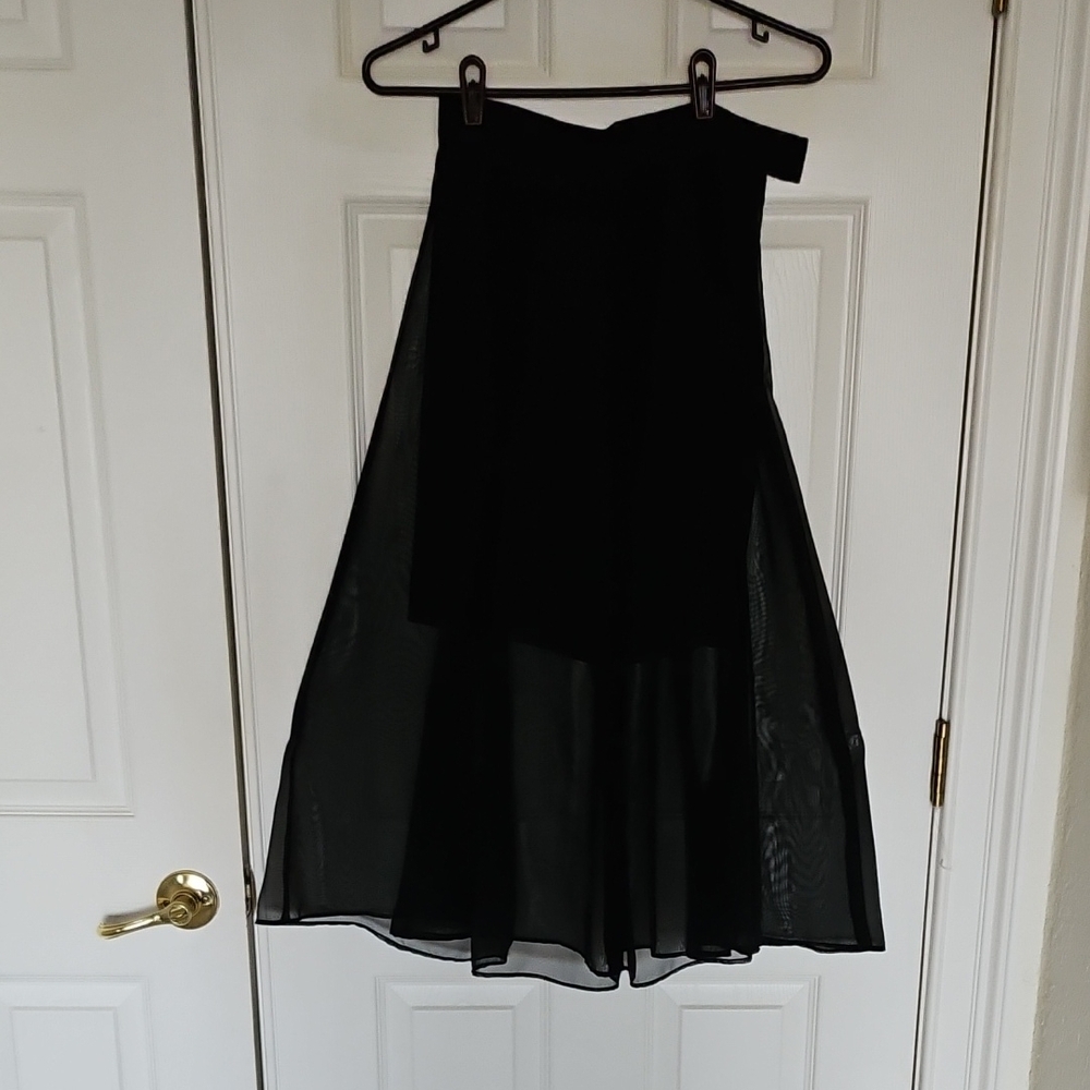 Fun & Unique black mini skirt with a black sheer Midi skirt on top.